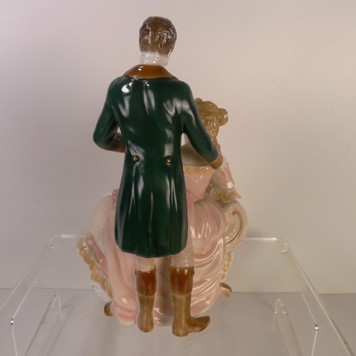 164 - A Royal Worcester figurine of a lady 