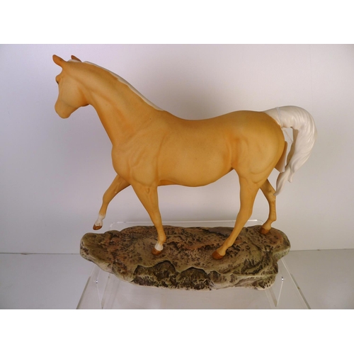 165 - A Beswick horse, 29cm tall