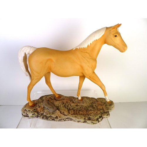 165 - A Beswick horse, 29cm tall