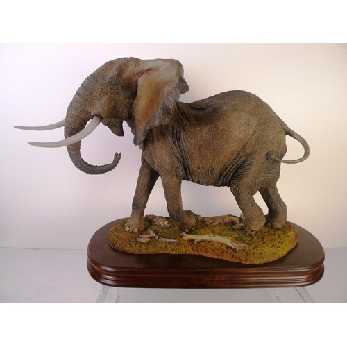 177 - A country artists elephant, 32 cm tall 