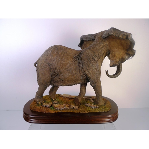 177 - A country artists elephant, 32 cm tall 