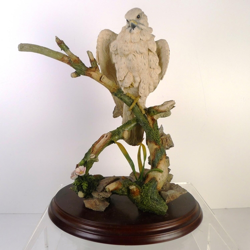 179 - A Country Artists white bird of prey, 34cm tall 