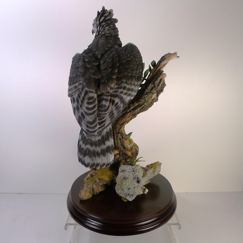 180 - A country artists bird of prey, 53cm tall 