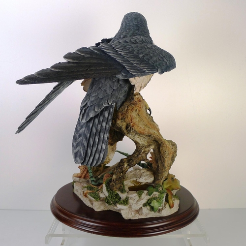 199 - A Country artists bird of prey, 41cm tall 