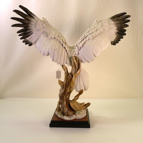 2 - A resin figure of a bird of prey 55cm tall