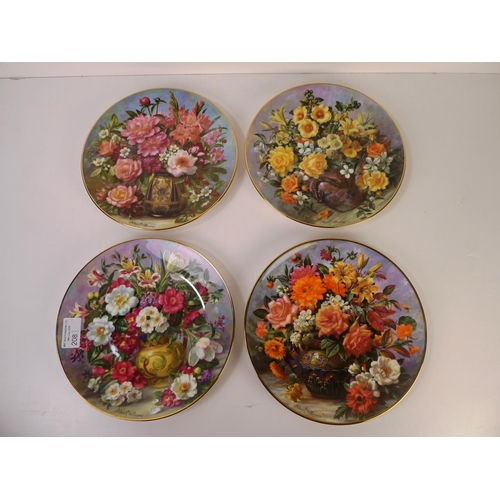 208 - A set of four Royal Doulton floral patterned plates