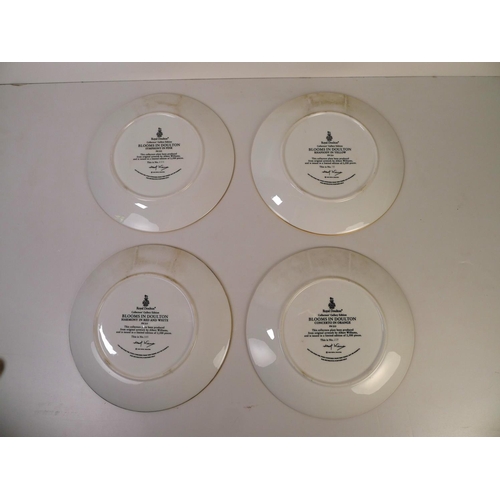 208 - A set of four Royal Doulton floral patterned plates