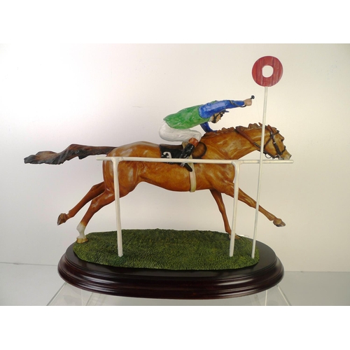 211 - A Country artists horse & jockey, 29cm tall 