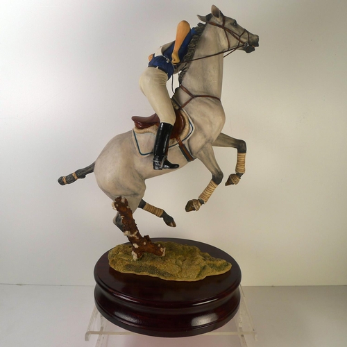 212 - A Sherratt and Simpson show jumper, 54cm tall 