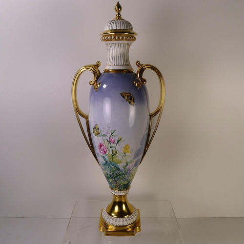 298 - A tall Spode floral & butterfly decorated prestige vase with cover, 55cm tall, damaged