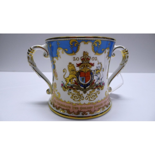 301 - A Royal collection limited edition Golden Jubilee loving Cup and matching plate