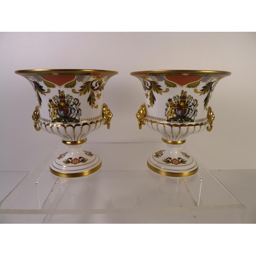 303 - 2 Royal Worcester limited edition diamond jubilee trophy cups, 15cm tall