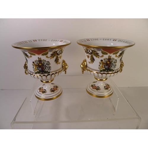 303 - 2 Royal Worcester limited edition diamond jubilee trophy cups, 15cm tall