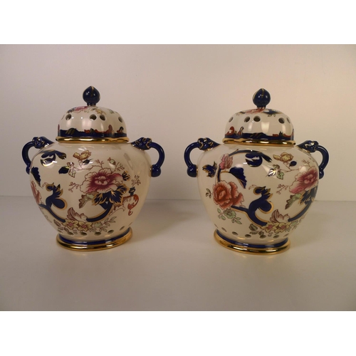 327 - A pair of Masons blue Mandalay Spice jars with covers 19 cm high