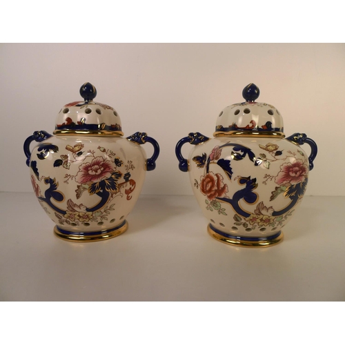 327 - A pair of Masons blue Mandalay Spice jars with covers 19 cm high