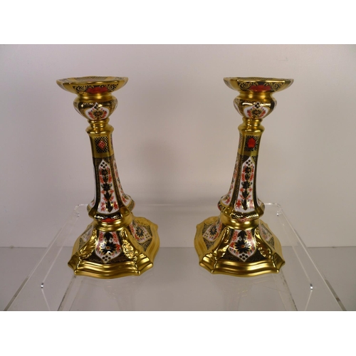 348 - A pair of Royal Crown Derby old Imari 1128 castleton candlesticks 17 cm tall. With boxes