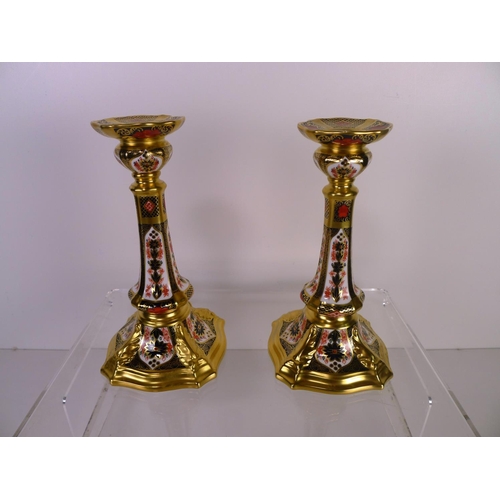 348 - A pair of Royal Crown Derby old Imari 1128 castleton candlesticks 17 cm tall. With boxes