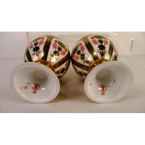 349 - A pair of Royal Crown Derby old Imari 1128 Sudbury vases with covers, 20cm tall. With boxes