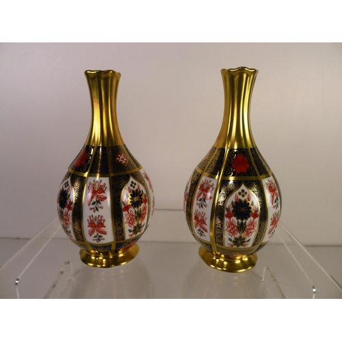 353 - A pair of Royal Crown Derby old Imari 1128 orchid vases, 17cm tall, with boxes