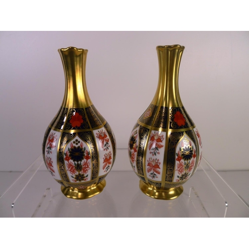 353 - A pair of Royal Crown Derby old Imari 1128 orchid vases, 17cm tall, with boxes