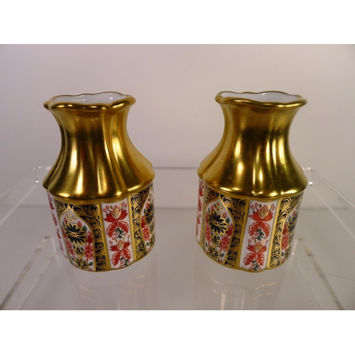 355 - A pair of Royal Crown Derby old Imari 1128, 9cm tall, with boxes