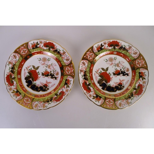 363 - A pair of Royal Crown Derby golden peony plates, 22cm diameter, with boxes