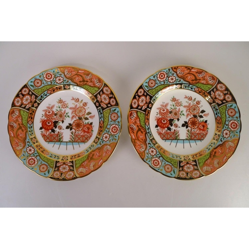 364 - A pair of Royal Crown Derby regency flowers plates, 22cm diameter, with boxes