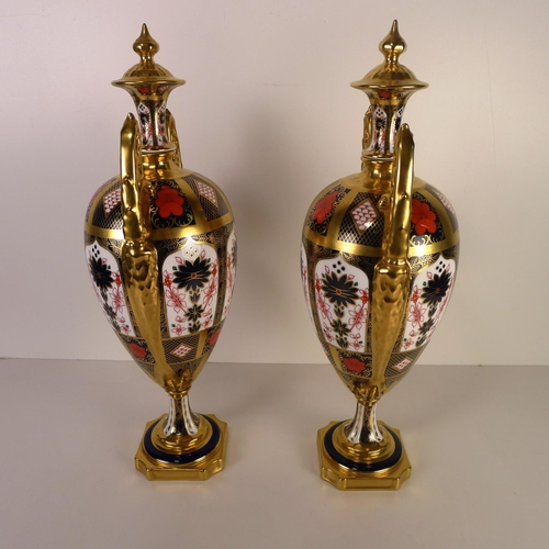 365 - A pair of Royal Crown Derby old Imari 1128 trophy vases, 42 cm, with boxes