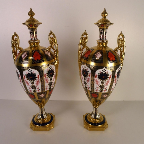 365 - A pair of Royal Crown Derby old Imari 1128 trophy vases, 42 cm, with boxes