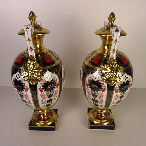 370 - A pair of Royal Crown Derby old Imari 1128 two handled Repton vases with covers 36 cm tall, with box... 