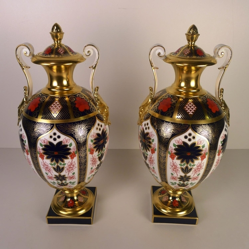 370 - A pair of Royal Crown Derby old Imari 1128 two handled Repton vases with covers 36 cm tall, with box... 