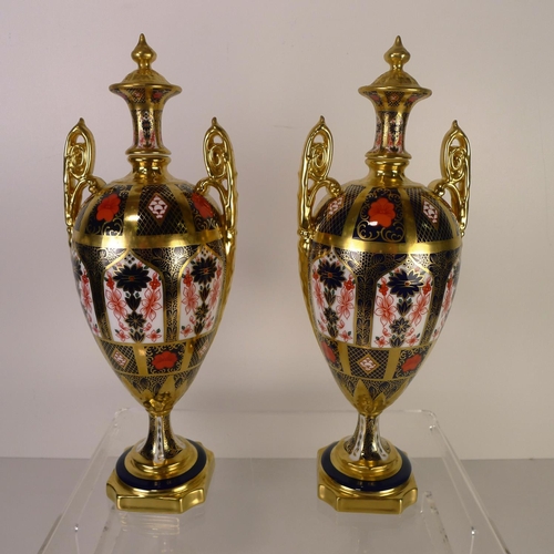 371 - A pair of Royal Crown Derby old Imari 1128 trophy vases, 31cm tall, with boxes