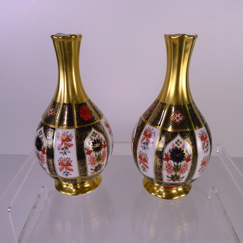 378 - A pair of Royal Crown Derby old Imari 1128 orchid vases, 17cm tall, with boxes