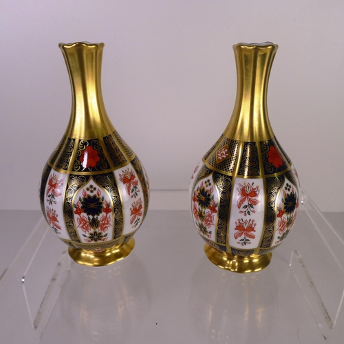 378 - A pair of Royal Crown Derby old Imari 1128 orchid vases, 17cm tall, with boxes