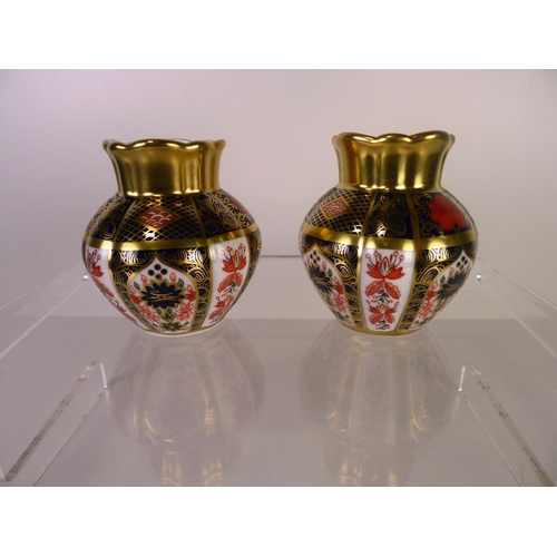 379 - A pair of Royal Crown Derby old Imari 1128 viola vases, 8cm tall, with boxes