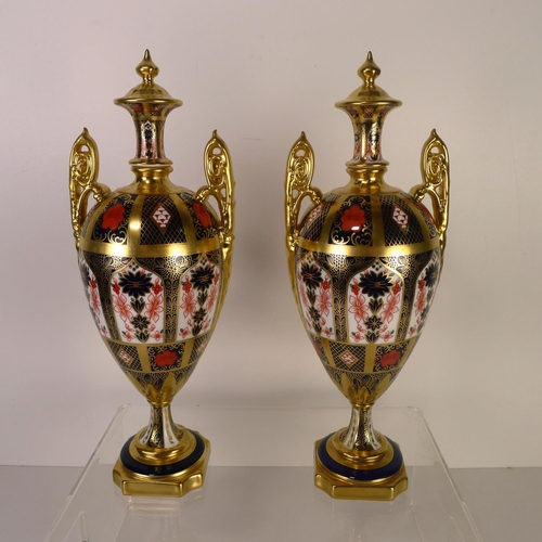 384 - A pair of Royal Crown Derby old Imari 1128 trophy vases, 32 cm tall, with boxes