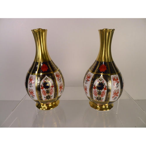 390 - A pair of Royal Crown Derby old Imari 1128 orchid vases, 17cm with boxes