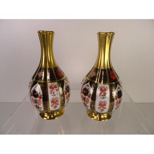 390 - A pair of Royal Crown Derby old Imari 1128 orchid vases, 17cm with boxes