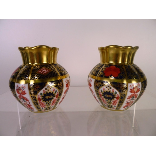 392 - A pair of Royal Crown Derby old Imari 1128 viola vases, 8cm tall, one box only