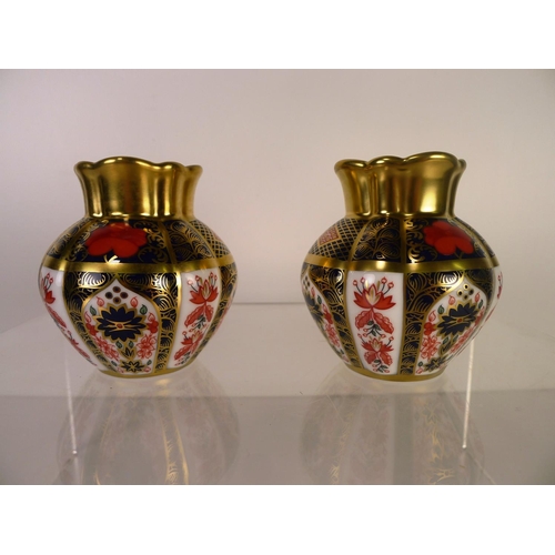 392 - A pair of Royal Crown Derby old Imari 1128 viola vases, 8cm tall, one box only