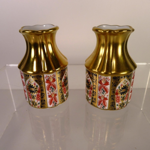 393 - A pair of Royal Crown Derby old Imari 1128 primrose vases, 8cm tall