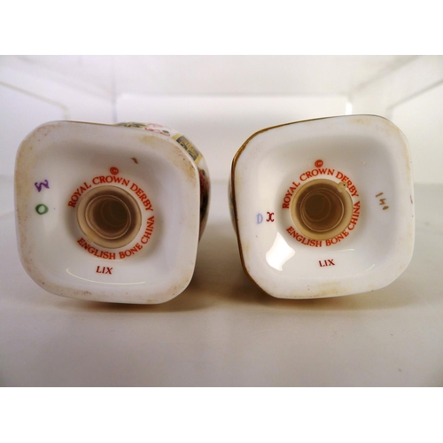 394 - A pair of Royal Crown Derby old Imari 1128 salt & pepper pots