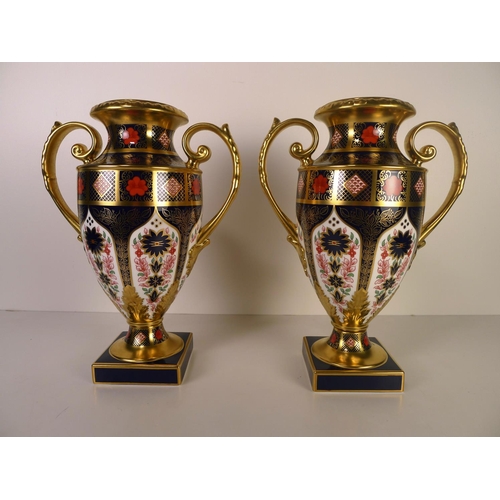 402 - A pair of Royal Crown Derby old Imari 1128 two handled Thorpe vases, 29cm tall, with boxes