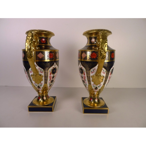402 - A pair of Royal Crown Derby old Imari 1128 two handled Thorpe vases, 29cm tall, with boxes