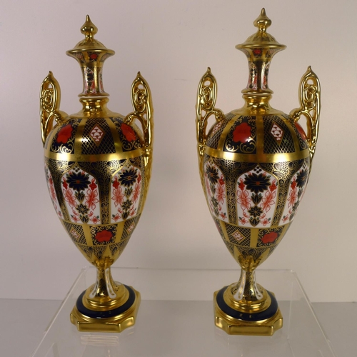 411 - A pair of Royal Crown Derby old Imari 1128 trophy vases, 31cm tall, with boxes