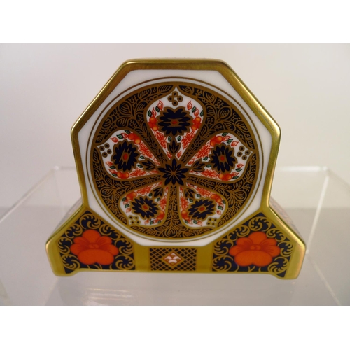 413 - A Royal Crown Derby old Imari 1128 mantel clock, 11cm tall, with box