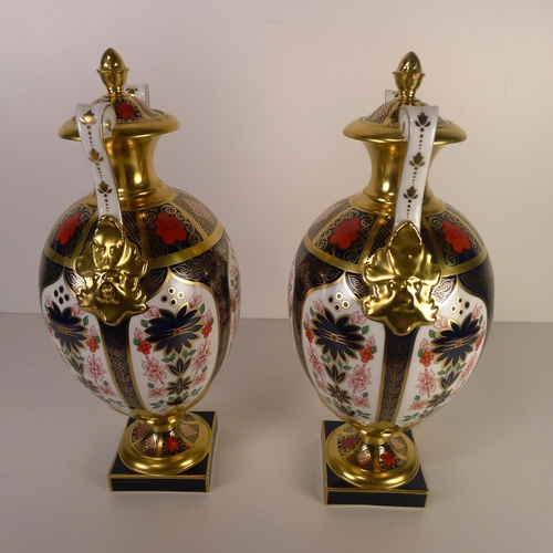419 - A pair of Royal Crown Derby old Imari 1128 two handled Repton vases, 35cm tall, with boxes