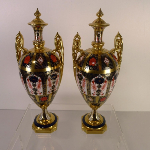 423 - A pair of Royal Crown Derby old Imari 1128 trophy vases, 30cm tall, with boxes