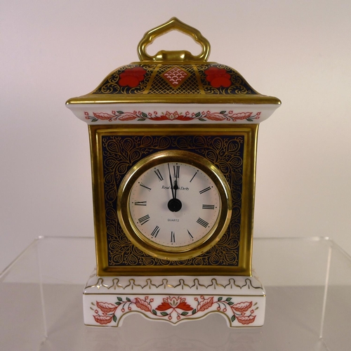 424 - A Royal Crown Derby old Imari 1128 mantel clock, 18cm tall, with box