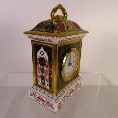 424 - A Royal Crown Derby old Imari 1128 mantel clock, 18cm tall, with box